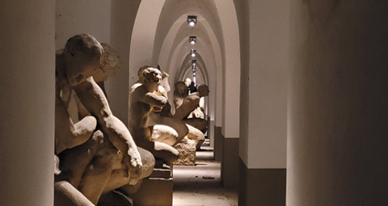 A corridor with plenty of sculptures